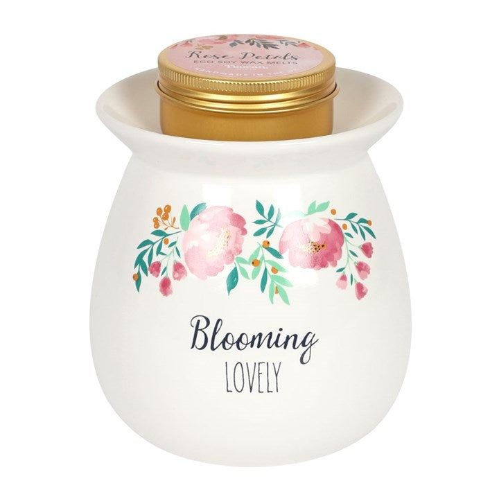 ceramic oil burner with blooming lovely text and floral pattern close up