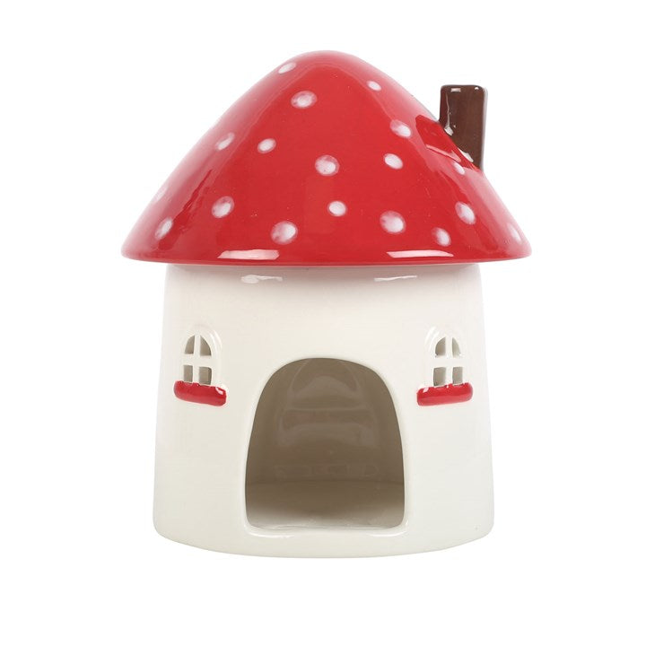 mushroom house ceramic oil and wax burner with cut out windows for tealight glow
