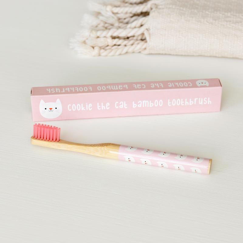 childrens bamboo toothbrush with cat design, biodegradable handle and soft bristles for gentle daily brushing