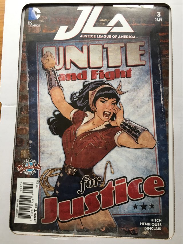 dc comics jla unite and fight for justice comic cover in clip frame