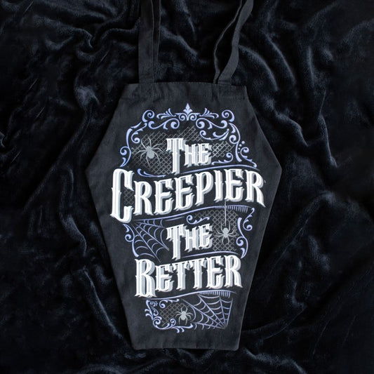 gothic coffin bag featuring bold slogan displayed on black fabric background
