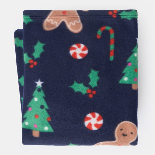 close up of gingerbread themed fleece throw fabric highlighting cosy plush finish
