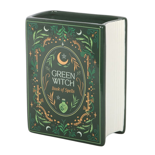 spellbook inspired green witch ceramic vase shown from angled view