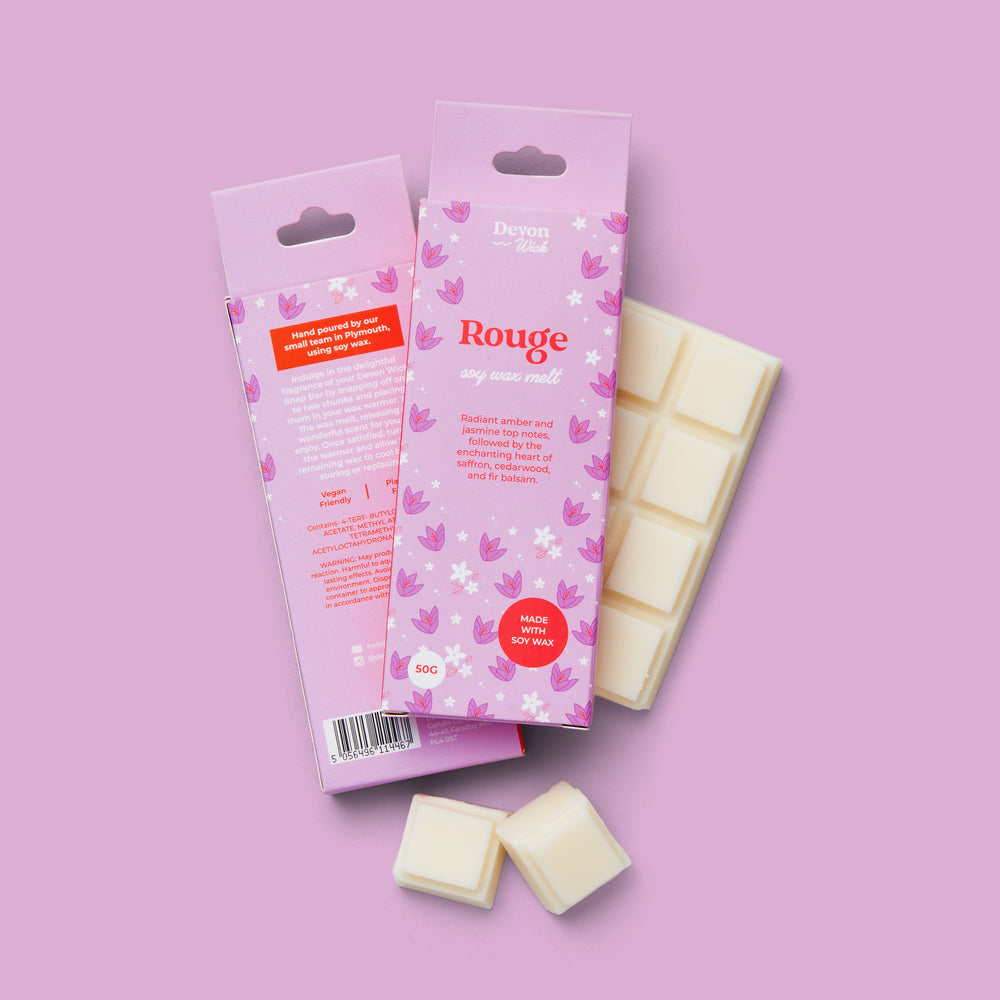 wax bar rouge with amber, jasmine, saffron, cedarwood, fir balsam, ambergris, oakmoss, and musk