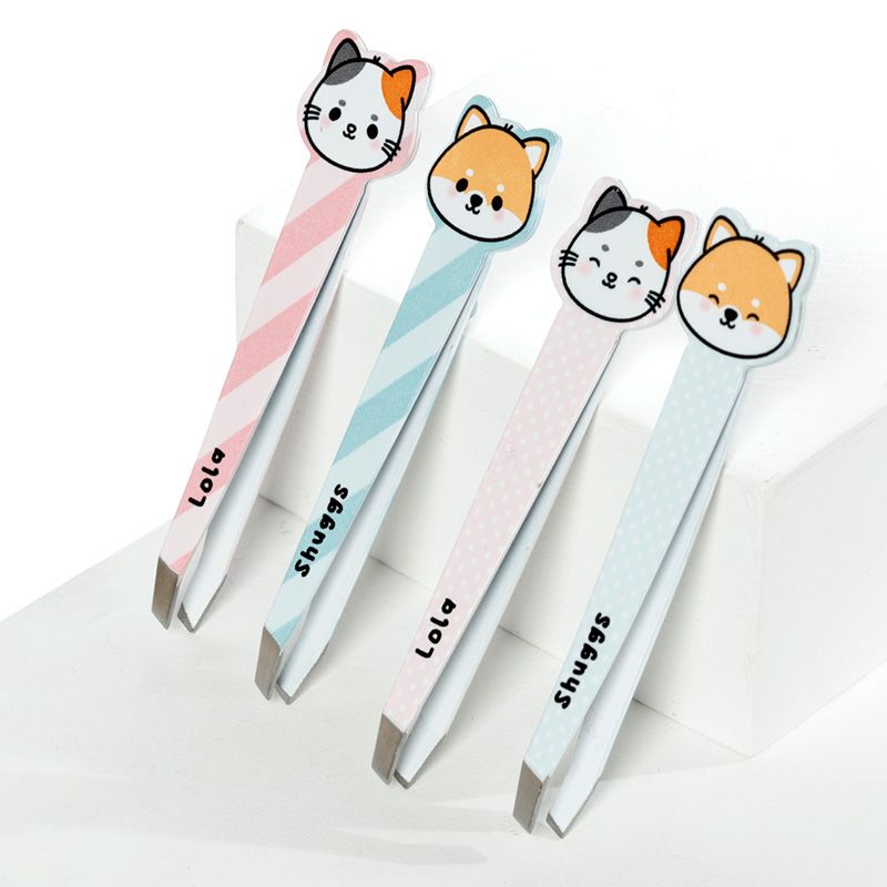 a set of four Adoramal Pets tweezers with cat face designs on the handles, in pink and blue colors with striped patterns