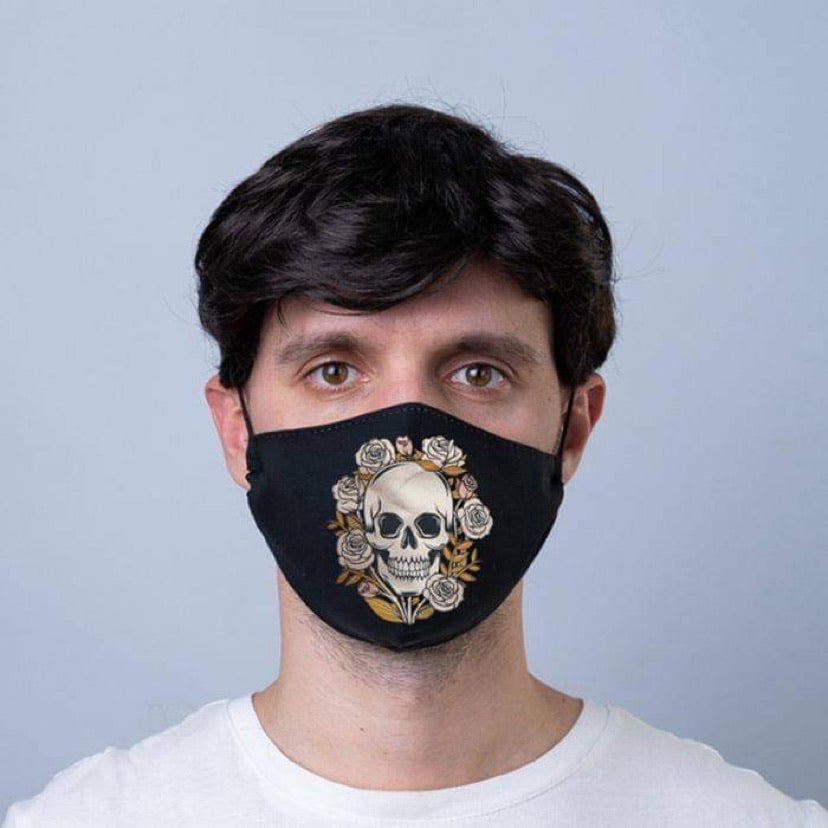 reusable adult face covering with skulls and roses design and adjustable ear straps