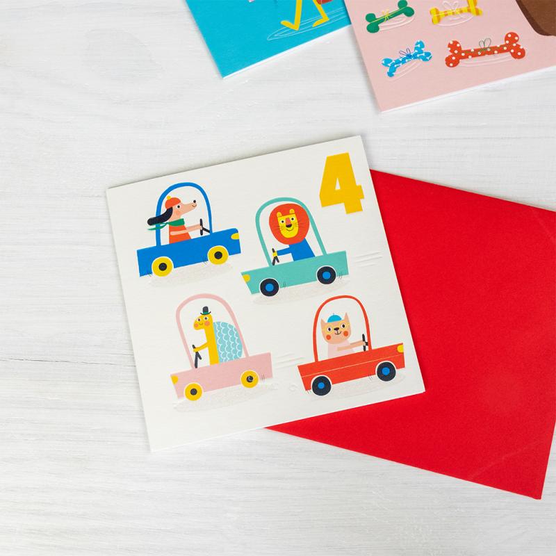 age 4 birthday card animals in car shown front on, featuring playful illustrated animals riding in cars on a square card with a debossed design and soft matte finish