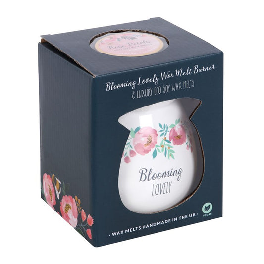 white ceramic oil burner with blooming lovely floral design front view