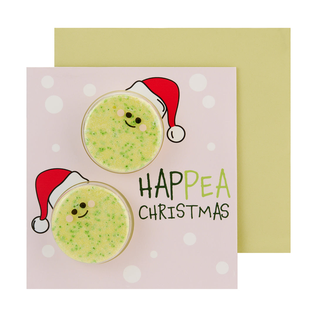 bubble t happea christmas card bath bomb shown as a festive greeting card with pea-shaped bath bomb inside
