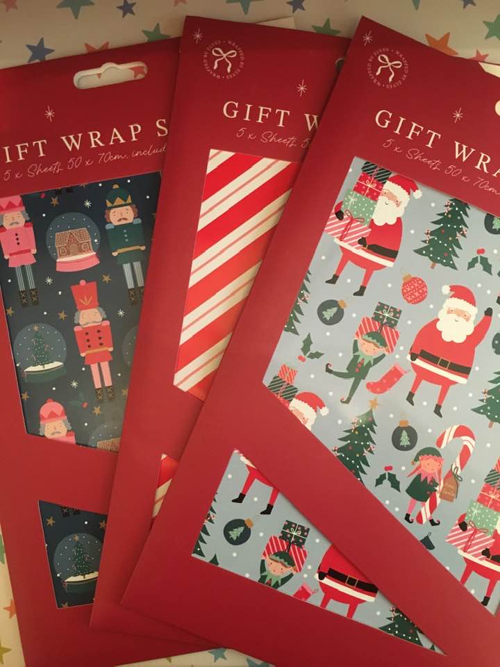 christmas gift wrap sheets, 5 sheets per pack with matching gift tags, available in nutcracker, santa, or red stripes designs, perfect for festive gift wrapping