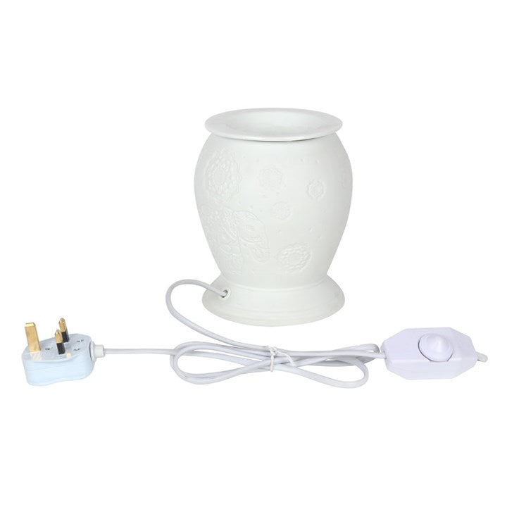 elephant electric wax burner with plug connection and fragrance dish detail visible