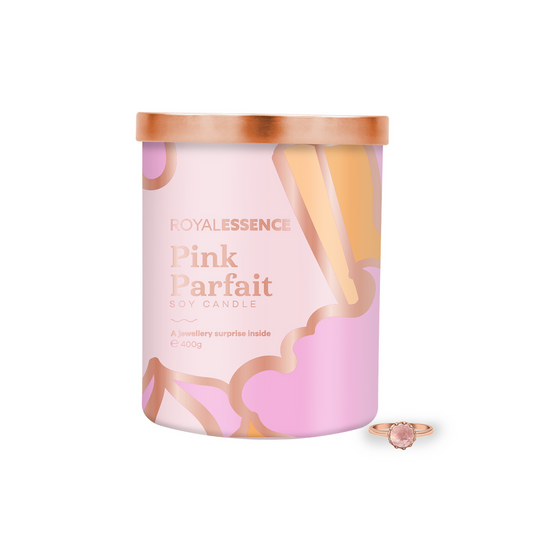 front view of sealed royal essence pink parfait rose gold candle with lid