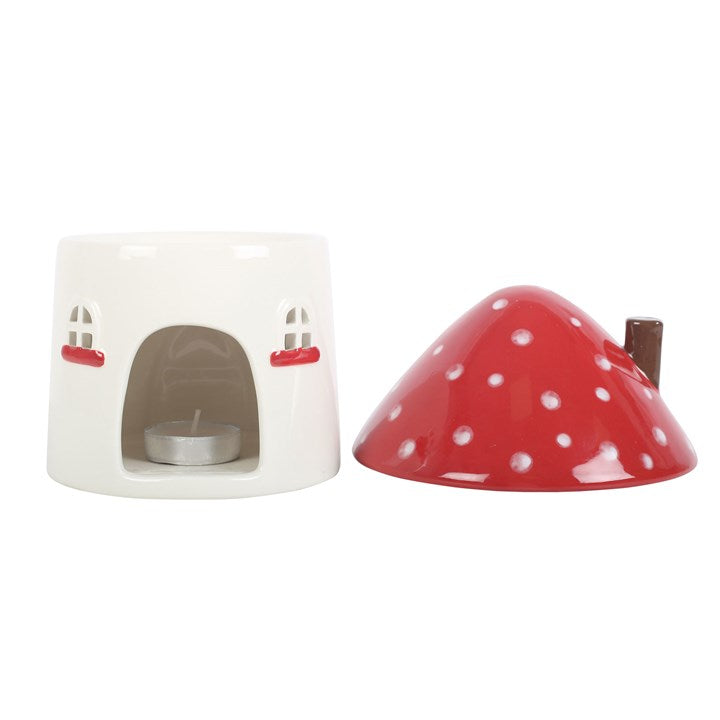 mushroom house wax melt burner displayed with removable lid beside unit