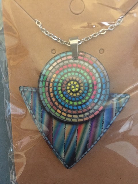 aztec necklace featuring tribal-inspired design, worn as a statement accessory for everyday or evening wear