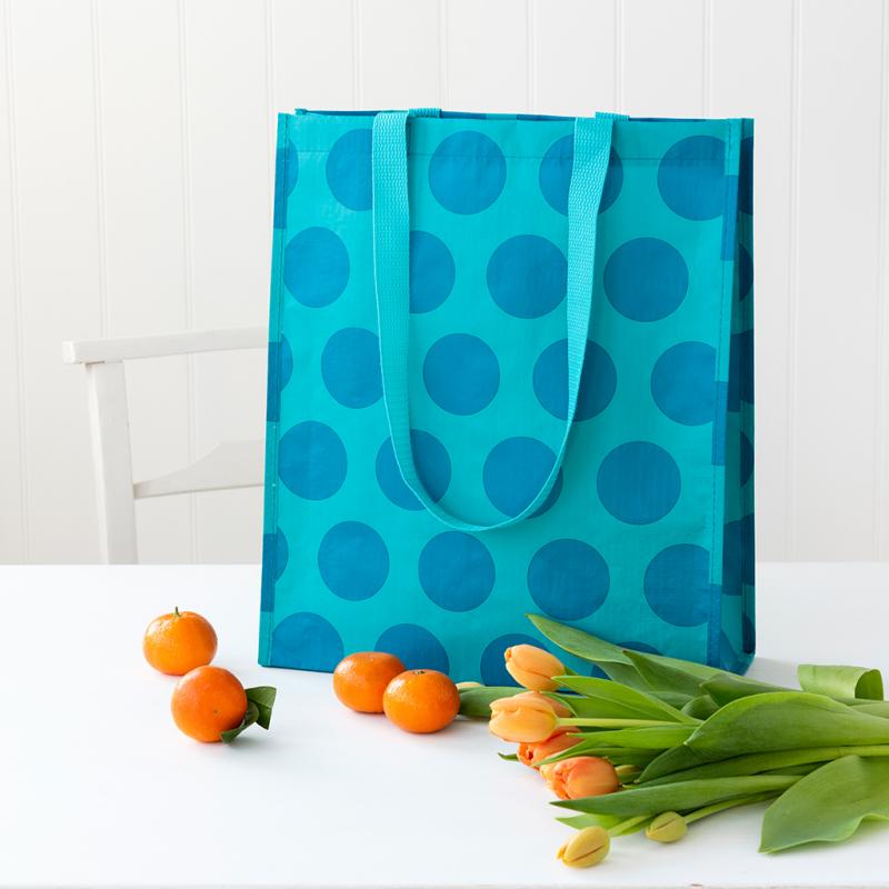 reusable shopping bag with colour choice in blue on turquoise or red on white with shoulder-length handles and sturdy design