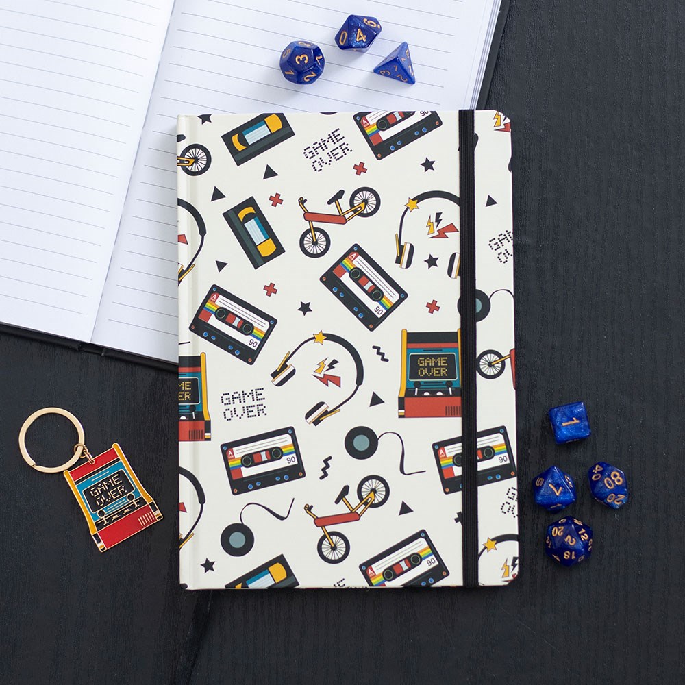 a5 lined notebook featuring retro cassette tapes game controllers and vintage bikes