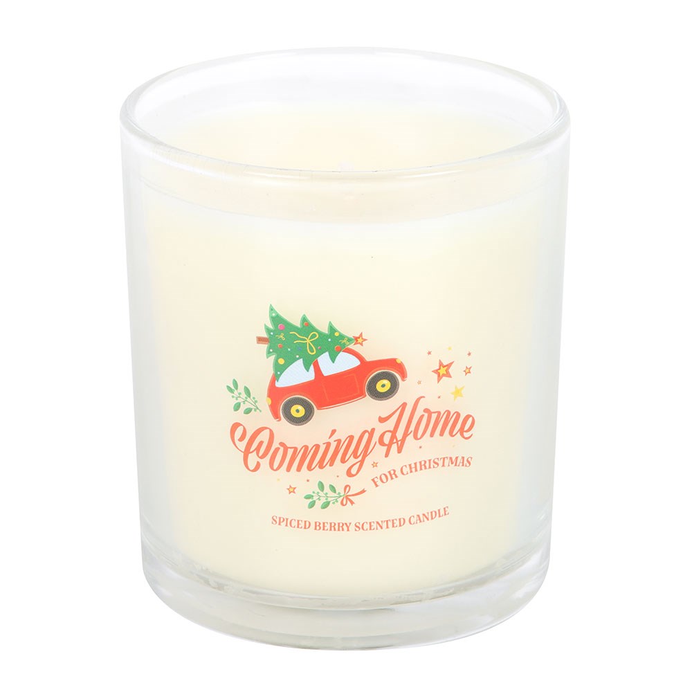 unwrapped christmas candle in glass holder with nostalgic red car design