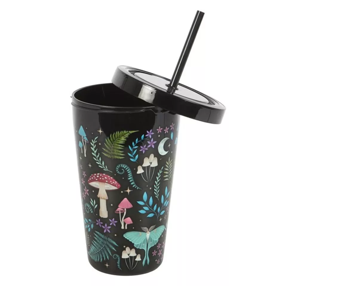 dark forest themed plastic tumbler with straw shown as reusable cold drinks cup