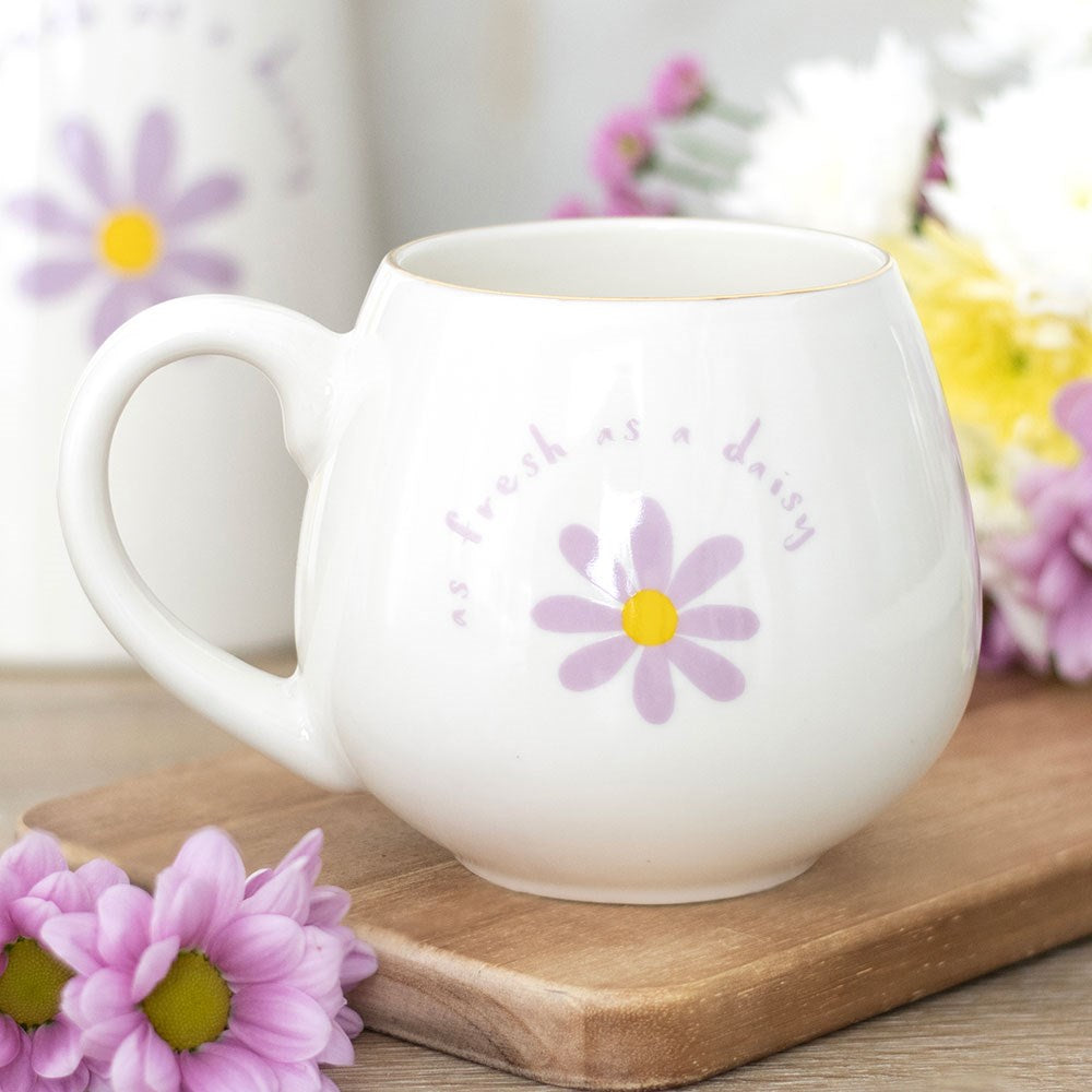 rounded 500ml mug featuring the cheerful phrase as fresh as a daisy