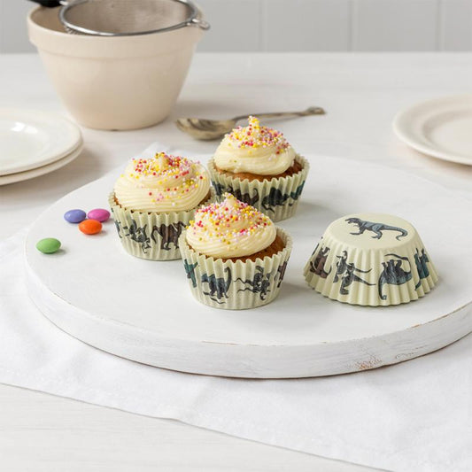 Dinosaur themed cupcake cases with colourful dinosaur designs, set of 50 paper cupcake cases for children’s birthday parties and baking.