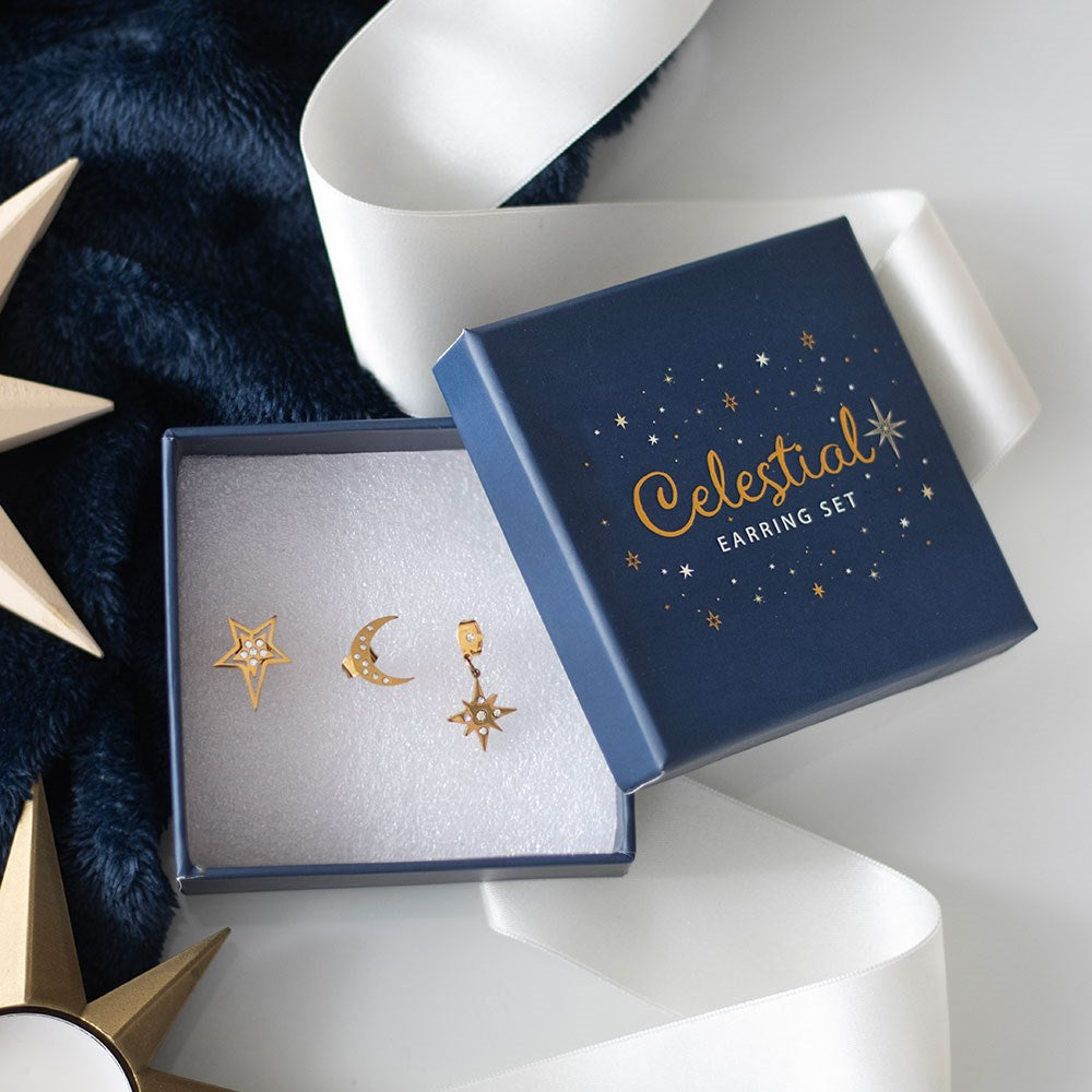gold tone celestial earrings displayed inside matching gift box with lid ajar