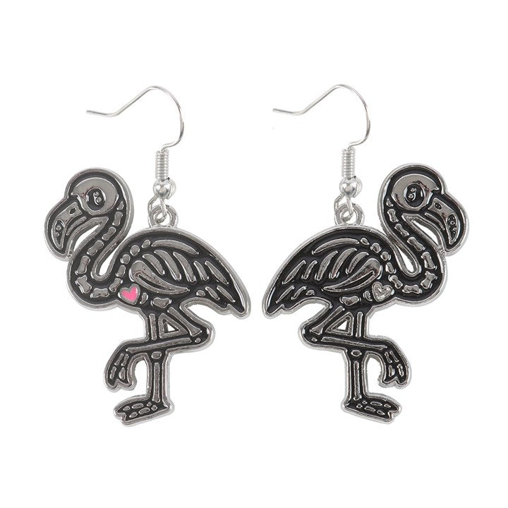 front view of flamin-goth enamel skeletal flamingo earrings with pink heart details