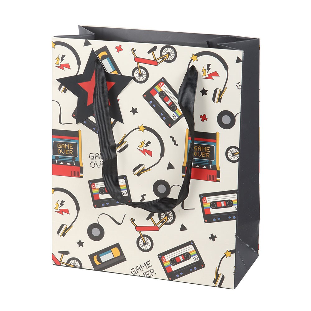 medium retro 80s print paper gift bag standing against a white background
