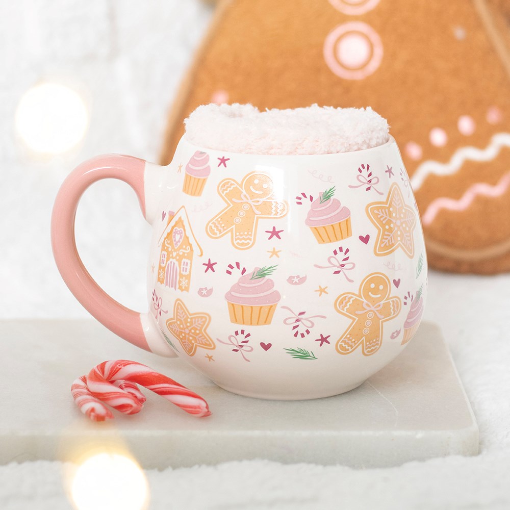 christmas gingerbread mug and fluffy socks displayed in a festive setting