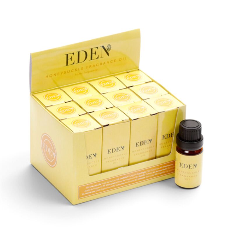 eden honeysuckle fragrance oil display with boxed bottles and one unboxed bottle