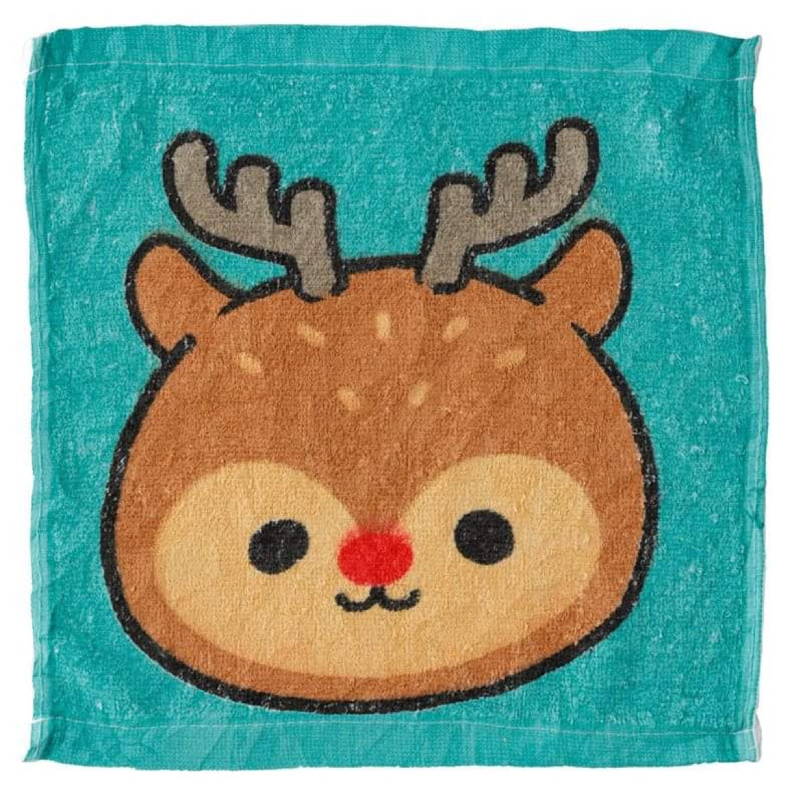 christmas festive friends compressed travel towel, neatly folded with label, ideal for packing light on festive trips