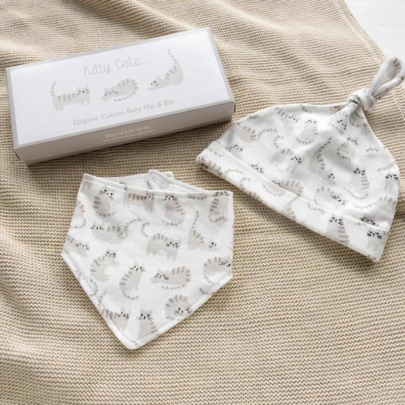 Organic cotton baby hat and bib set with cat design, soft eco-friendly newborn feeding and dribble set