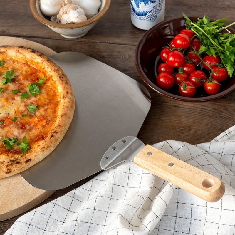 stainless steel pizza paddle for transferring homemade pizzas to pizza ovens barbecues and ovens