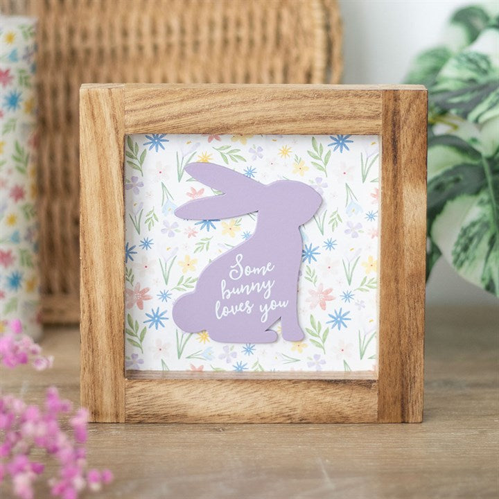 wooden framed rabbit sign some bunny loves you in home setting spring decor