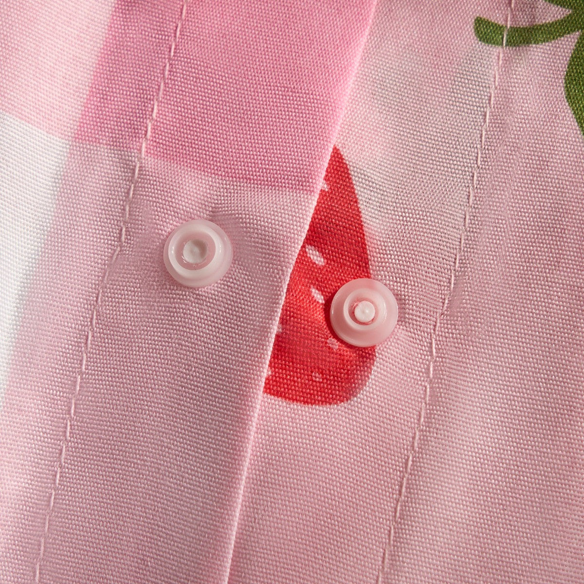 Popper fastener detail on children’s single duvet cover