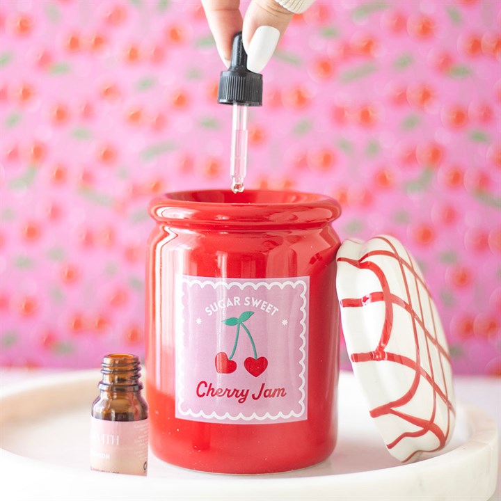 cherry jam jar ceramic oil burner shown open with gingham lid placed beside burner