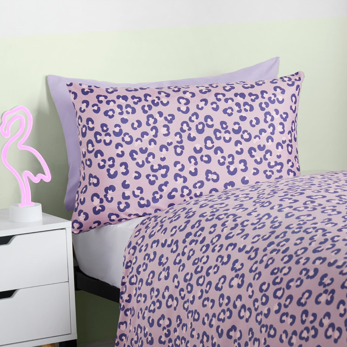 Reversible safari duvet cover set double size displayed with animal print bedding