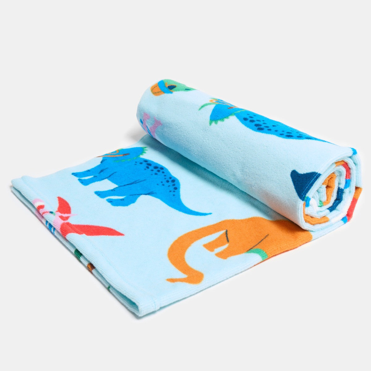 Rolled children’s dinosaur microfibre beach towel, compact quick-drying towel for kids