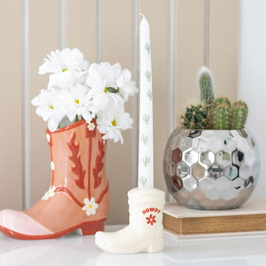 cowboy boot candle holder with cactus taper styled in western inspired home setting