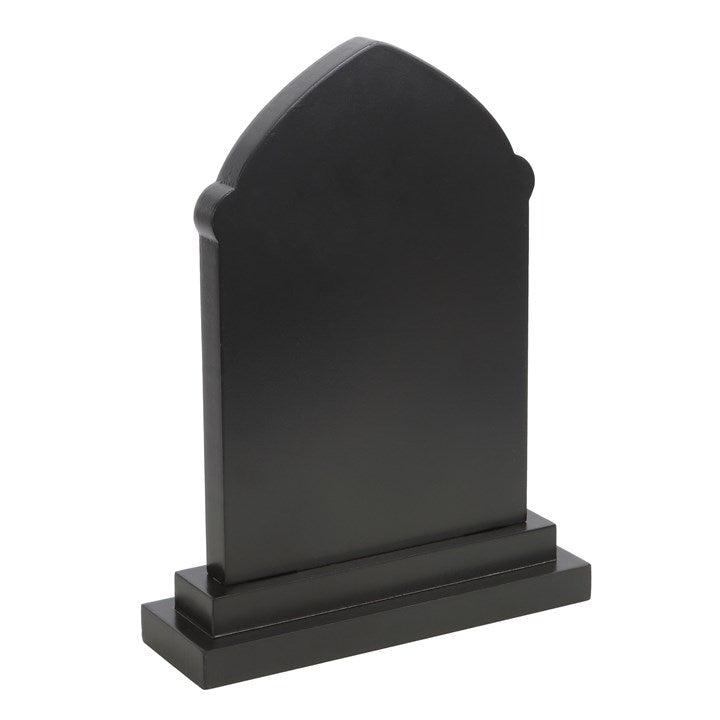 rear view of gothic tombstone sign showing solid decorative plaque finish