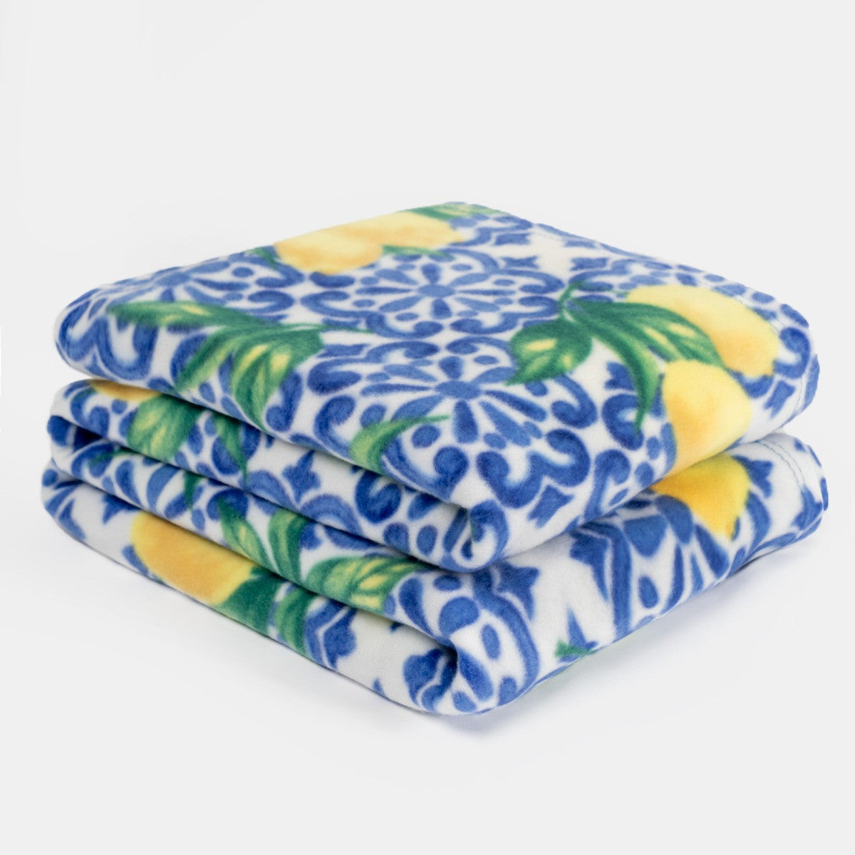 folded fleece throw showing soft texture and compact storage size