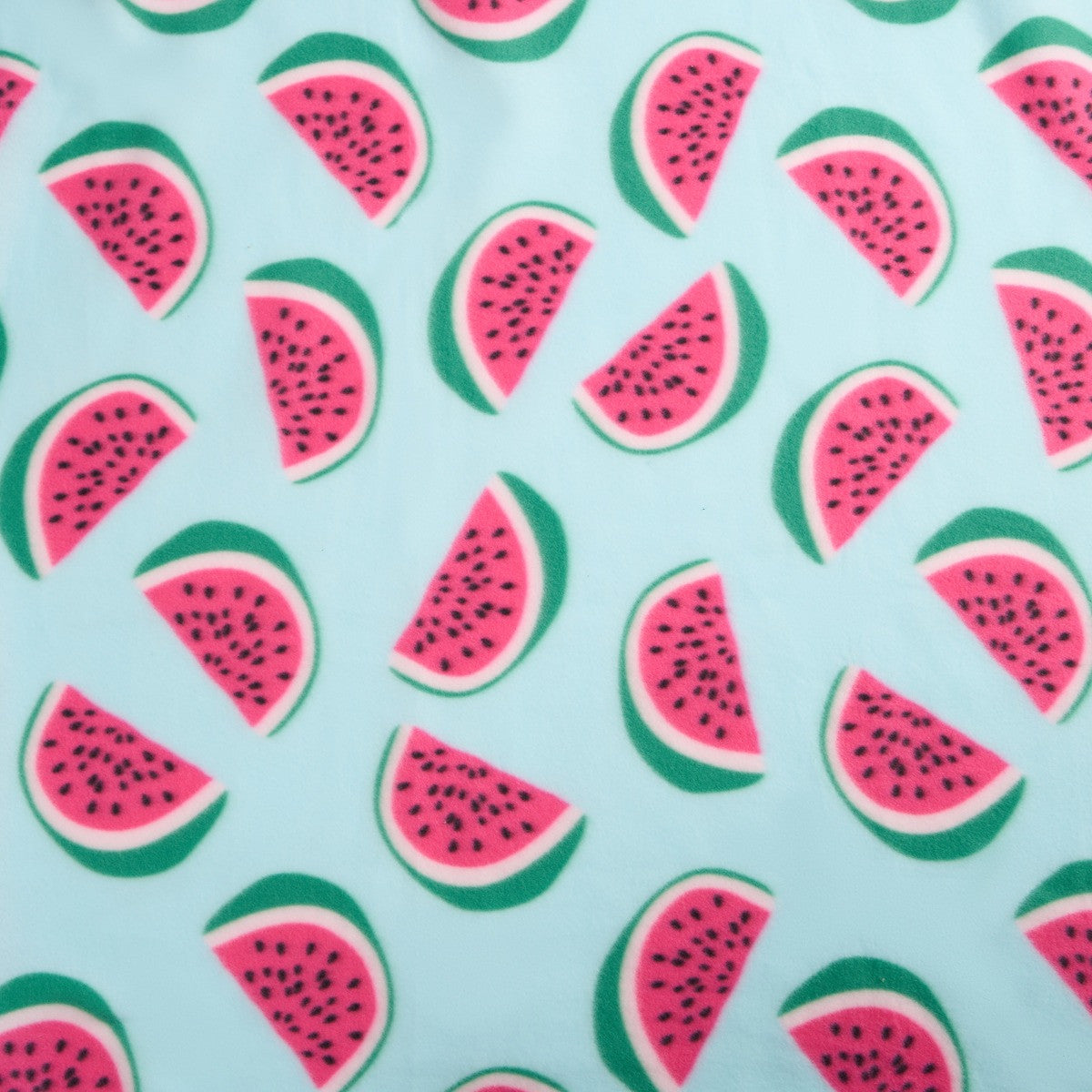 detailed close-up of watermelon fleece throw with emphasis on design
