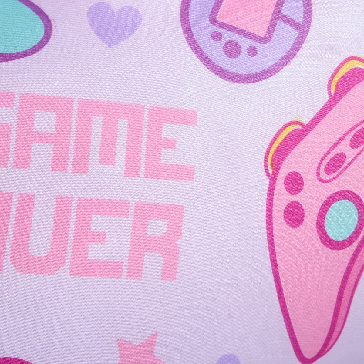 Detail of lilac and pink gamer design on children’s fleece bedding