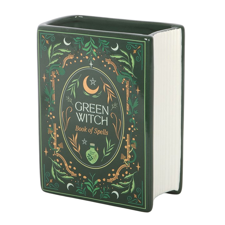 spellbook inspired green witch ceramic vase shown from angled view