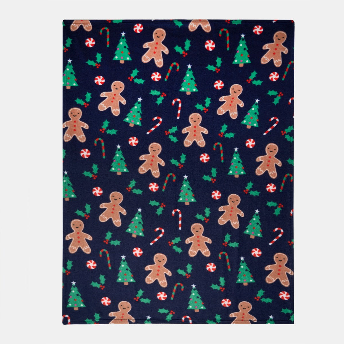 full view of gingerbread patterned fleece throw blanket laid flat showing overall design