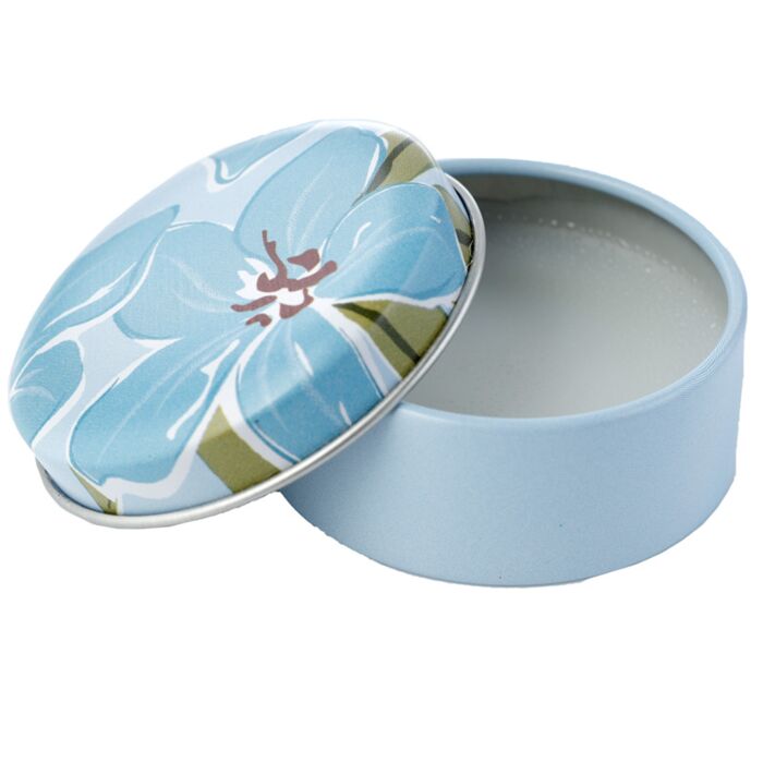 florens lip balm tin open showing nourishing balm inside