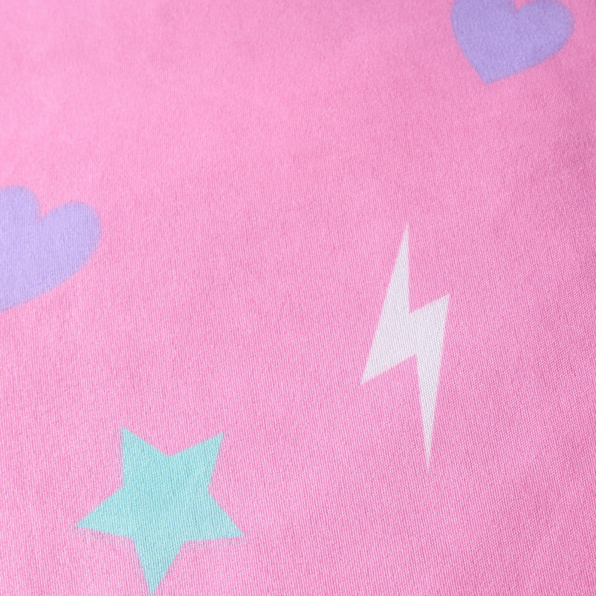 Close-up of gaming controller and console pattern on fleece duvet cover