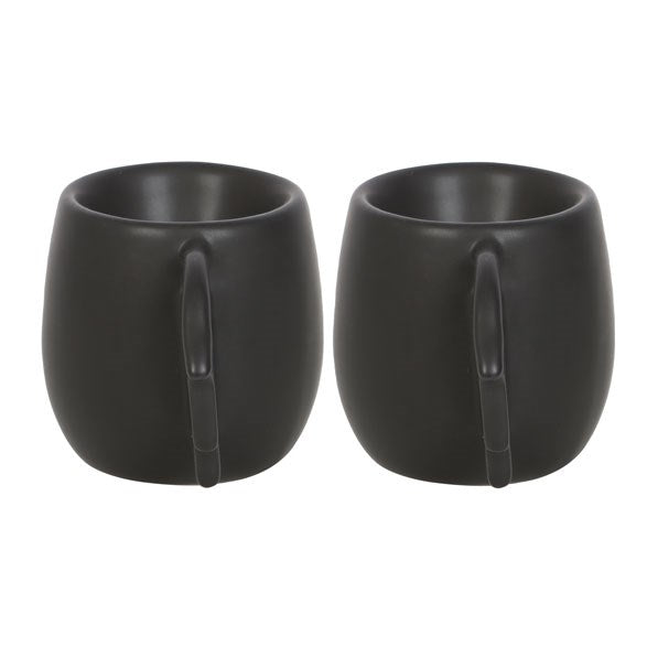 bat wing egg cups viewed end on showing compact black ceramic form