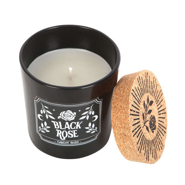 scented candle shown with cork lid resting against jar in styled setting