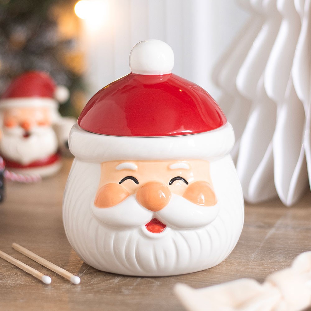 ceramic christmas santa oil burner and wax warmer with festive jolly design