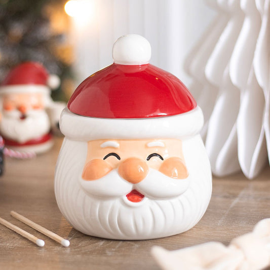 ceramic christmas santa oil burner and wax warmer with festive jolly design